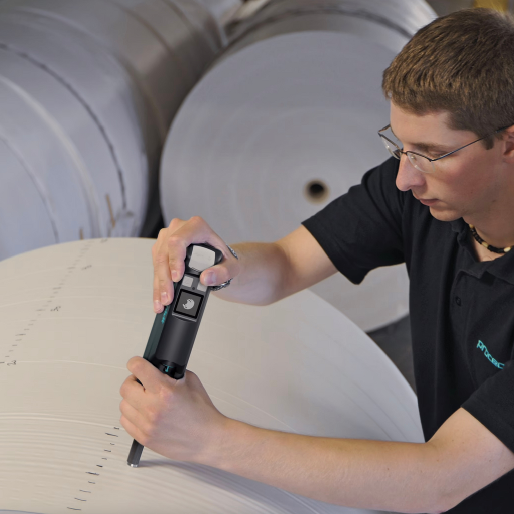 Paper Schmidt Test Hammer in Use